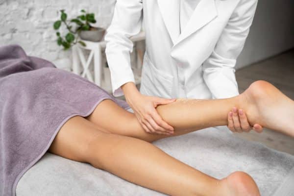 angle-woman-getting-massaged-spa